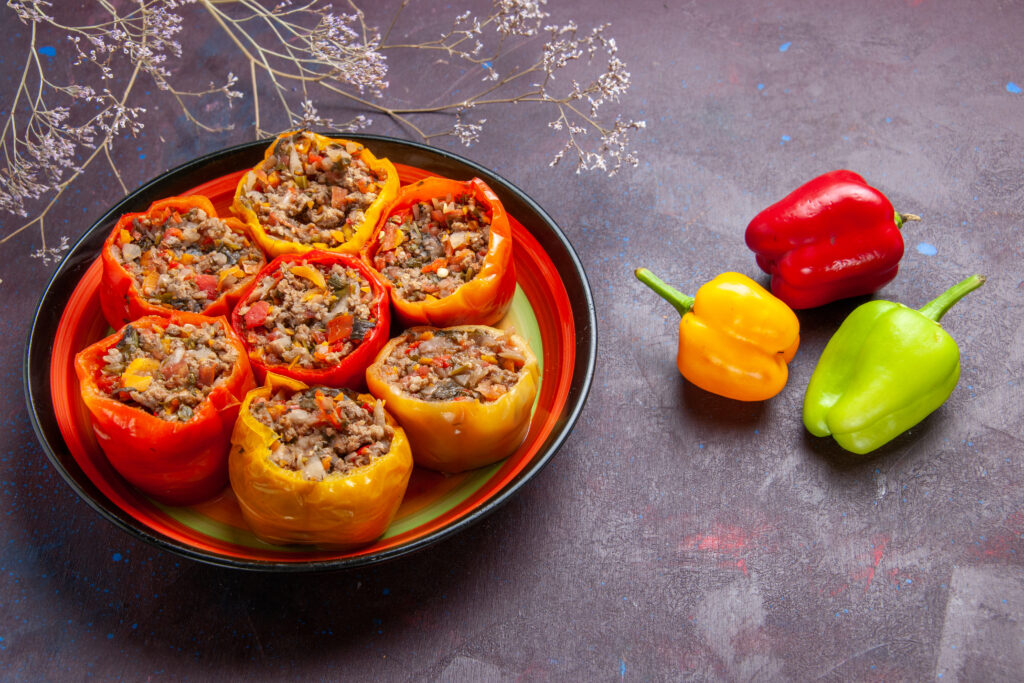 Stuffed Bell Peppers with Spicy Tomato Sauce